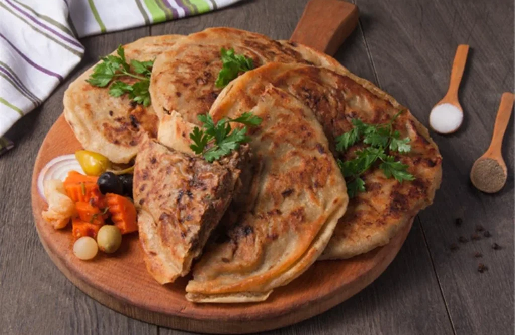 ساندوتش حواوشي - مطبخ صافي للأكل البيتي بالمنصورة