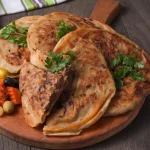 ساندوتش حواوشي - مطبخ صافي للأكل البيتي بالمنصورة